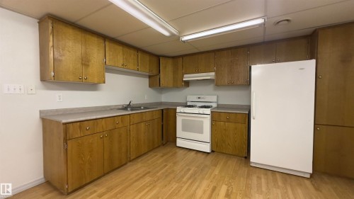 15024 55 Street, Edmonton, AB - Indoor Photo Showing Kitchen With Double Sink