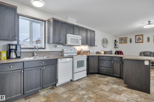 95 Willow Park Estates, Leduc, AB - Indoor Photo Showing Kitchen With Double Sink