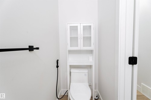 Bathroom with toilet and baseboards - 244 Rolston Wynd, Leduc, AB - Indoor