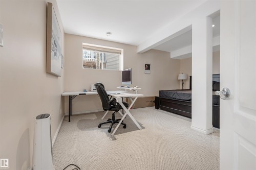 Office area with carpet flooring and baseboards - 20524 58 Avenue, Edmonton, AB - Indoor Photo Showing Office