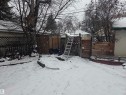 Yard covered in snow featuring a gate - 11516 88 Street, Edmonton, AB  - Outdoor 