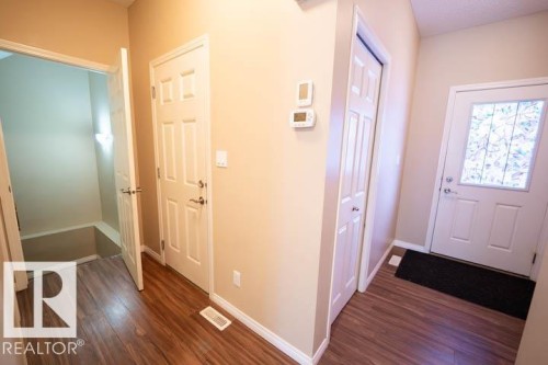 Entryway featuring dark wood-type flooring - 3117 Arthurs Crescent, Edmonton, AB - Indoor Photo Showing Other Room