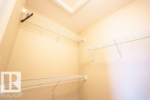 View of walk in closet - 3117 Arthurs Crescent, Edmonton, AB - Indoor With Storage