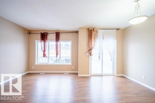 Spare room with wood finished floors - 3117 Arthurs Crescent, Edmonton, AB - Indoor Photo Showing Other Room