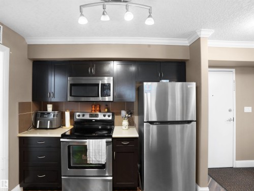 402 14604 125 Street, Edmonton, AB - Indoor Photo Showing Kitchen With Stainless Steel Kitchen
