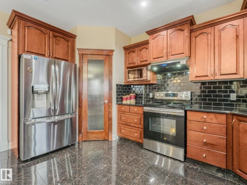 6911 17 Avenue, Edmonton, AB - Indoor Photo Showing Kitchen With Stainless Steel Kitchen