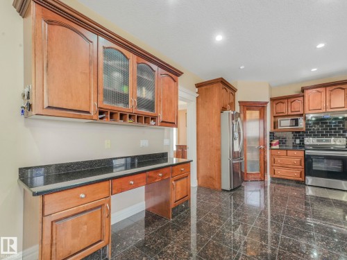 6911 17 Avenue, Edmonton, AB - Indoor Photo Showing Kitchen With Stainless Steel Kitchen