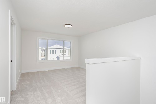 6302 Dansereau Crescent, Beaumont, AB - Indoor Photo Showing Other Room
