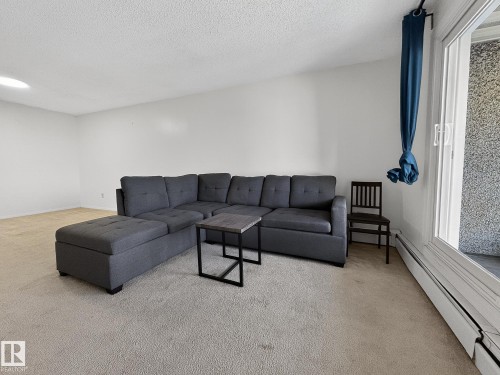 406 2620 Mill Woods Road E, Edmonton, AB - Indoor Photo Showing Living Room
