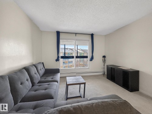 406 2620 Mill Woods Road E, Edmonton, AB - Indoor Photo Showing Living Room