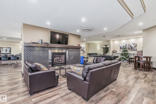 457 7805 71 Street, Edmonton, AB - Indoor Photo Showing Living Room With Fireplace