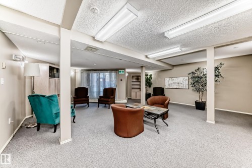 Building lobby with a textured ceiling - 507 11716 100 Avenue, Edmonton, AB - Indoor