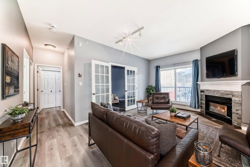 507 11716 100 Avenue, Edmonton, AB - Indoor Photo Showing Living Room With Fireplace