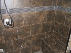 Bathroom view of a tile shower - 
