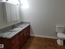 Bathroom with toilet and vanity - 