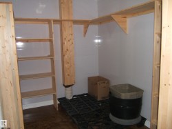 Below grade area featuring baseboards - 