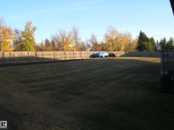 View of fenced backyard - 