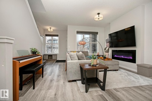 2219 160 Street, Edmonton, AB - Indoor Photo Showing Living Room With Fireplace