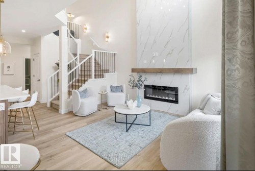 320 27 Street, Edmonton, AB - Indoor Photo Showing Living Room With Fireplace