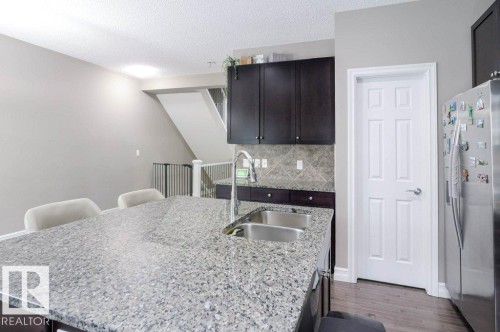 97 2003 Rabbit Hill Road, Edmonton, AB - Indoor Photo Showing Kitchen With Double Sink