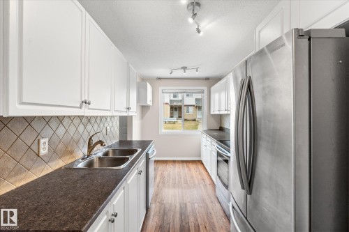 5C Twin Terrace, Edmonton, AB - Indoor Photo Showing Kitchen With Double Sink