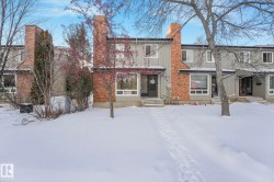 View of front of home with a chimney - 