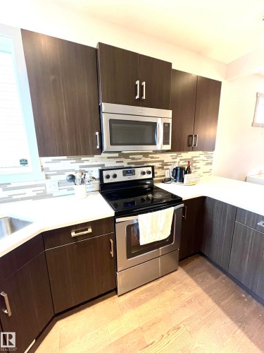 16464 15 Avenue, Edmonton, AB - Indoor Photo Showing Kitchen With Stainless Steel Kitchen With Upgraded Kitchen