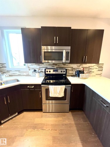 16464 15 Avenue, Edmonton, AB - Indoor Photo Showing Kitchen With Stainless Steel Kitchen With Upgraded Kitchen