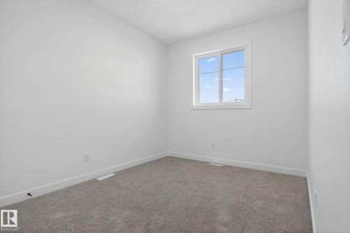 124 Pierwyck Loop, Spruce Grove, AB - Indoor Photo Showing Other Room