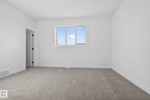 124 Pierwyck Loop, Spruce Grove, AB - Indoor Photo Showing Other Room