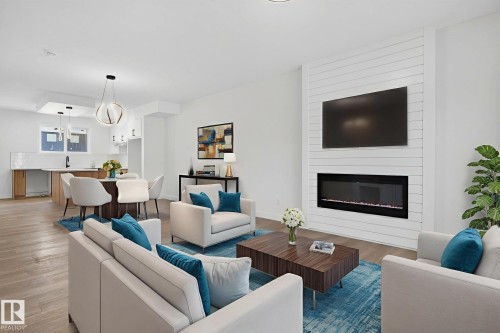 124 Pierwyck Loop, Spruce Grove, AB - Indoor Photo Showing Living Room With Fireplace