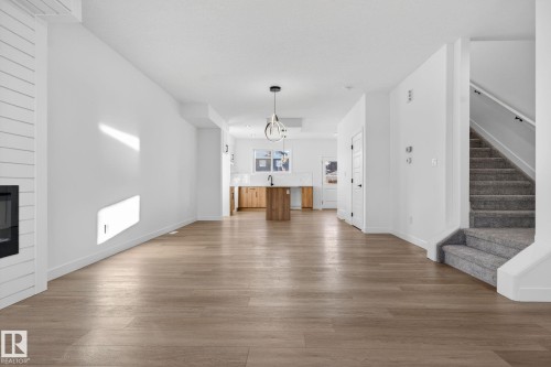 128 Pierwyck Loop, Spruce Grove, AB - Indoor Photo Showing Living Room With Fireplace