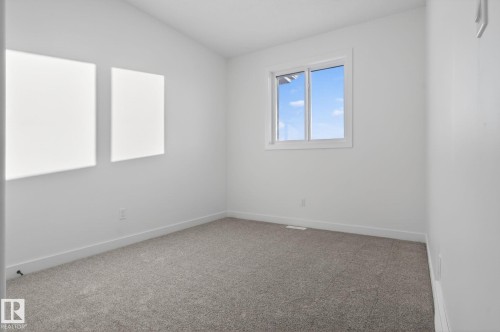 128 Pierwyck Loop, Spruce Grove, AB - Indoor Photo Showing Other Room