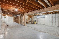 Unfinished below grade area with stairway - 