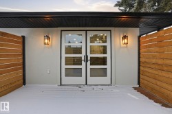 View of exterior entry featuring french doors - 