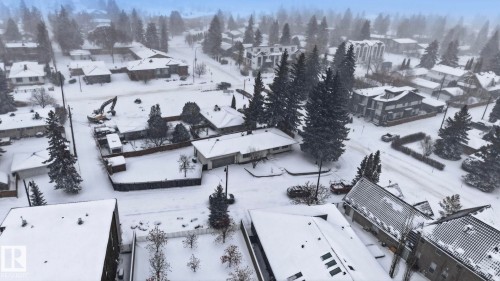 Snowy aerial view with a residential view - 14604 Mackenzie Drive, Edmonton, AB - Outdoor With View