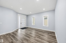 Entrance foyer featuring recessed lighting and wood finished floors - 