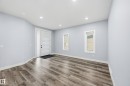 Entrance foyer featuring recessed lighting and wood finished floors - 829 Morris Avenue, Leduc, AB  - Indoor Photo Showing Other Room 