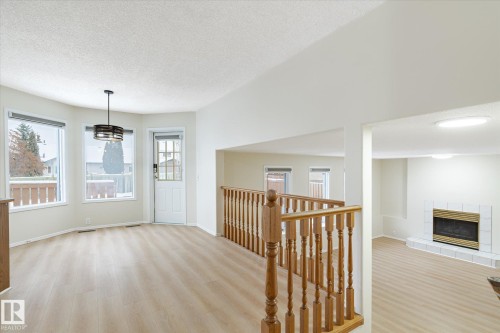 1187 Potter Greens Drive, Edmonton, AB - Indoor Photo Showing Other Room With Fireplace