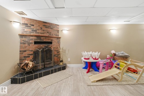 9904 171 Avenue Nw, Edmonton, AB - Indoor Photo Showing Other Room With Fireplace