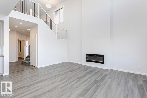 8 Cloutier Close, St. Albert, AB - Indoor With Fireplace