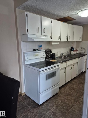 4 Amberly Crest, Edmonton, AB - Indoor Photo Showing Kitchen With Double Sink