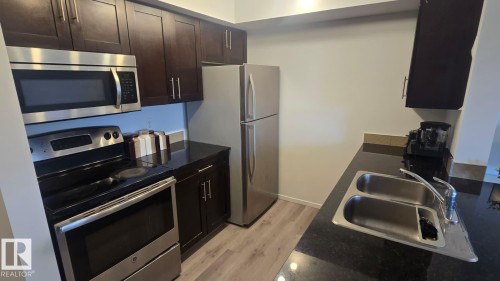 218 1510 Watt Drive, Edmonton, AB - Indoor Photo Showing Kitchen With Stainless Steel Kitchen With Double Sink