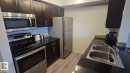 218 1510 Watt Drive, Edmonton, AB  - Indoor Photo Showing Kitchen With Stainless Steel Kitchen With Double Sink 