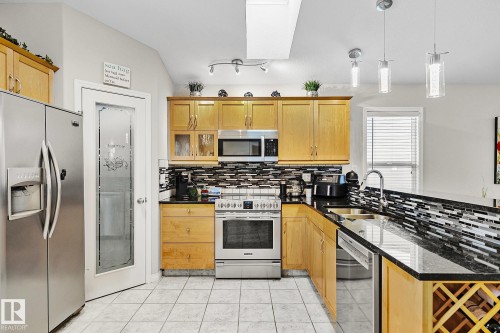 1035 Macewan Close, Edmonton, AB - Indoor Photo Showing Kitchen With Double Sink With Upgraded Kitchen
