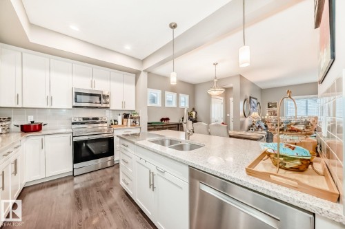 18136 76 Street, Edmonton, AB - Indoor Photo Showing Kitchen With Stainless Steel Kitchen With Double Sink With Upgraded Kitchen
