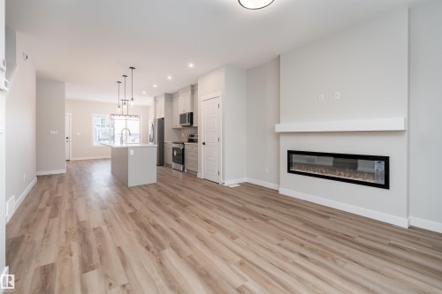 8532 96 Avenue, Morinville, AB - Indoor Photo Showing Living Room With Fireplace