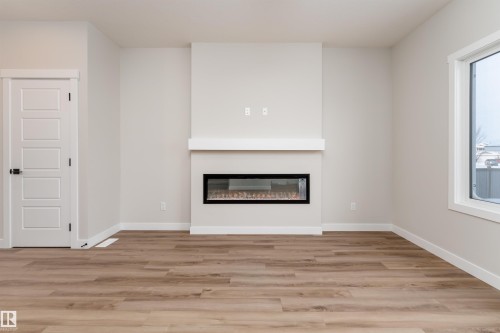 8532 96 Avenue, Morinville, AB - Indoor Photo Showing Living Room With Fireplace