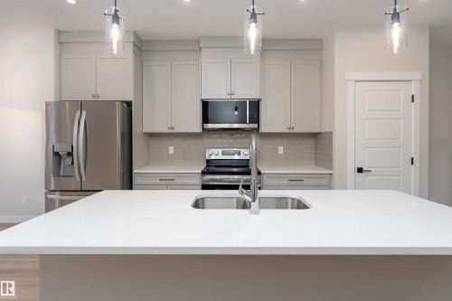 8532 96 Avenue, Morinville, AB - Indoor Photo Showing Kitchen With Double Sink With Upgraded Kitchen
