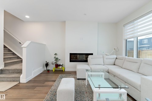 3543 Erlanger Link, Edmonton, AB - Indoor Photo Showing Living Room With Fireplace